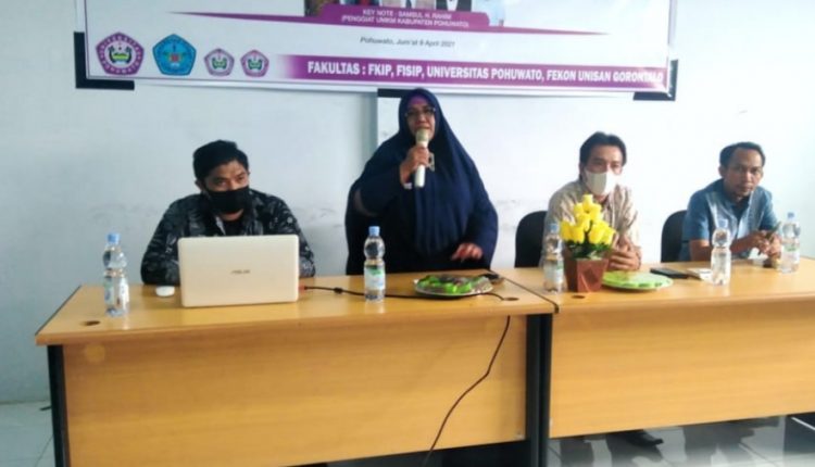 Dr. Dra. Hj. Rusni Djafar. MPA,